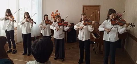 Ансамбль скрипачей